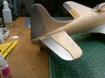 How much a little covering adds. Added a piece of 1/8 balsa at the base of the rudder to fill the gap in before I covered it.