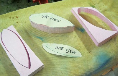 Make templates of the floats and cut the foam block. These get shaped by roughing and hand sanding.