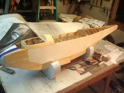 The hatch frame is made and nose sheeted. Wood use is preferred ahead of the wing leading edge into the hatch for strength.